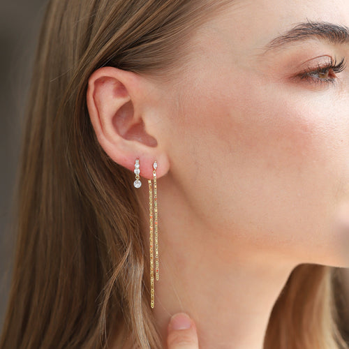 Load image 1 in gallery view. CZ Huggie with Floating CZ Charm